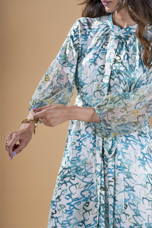 Teal calligraphy print tie-up shirt dress.