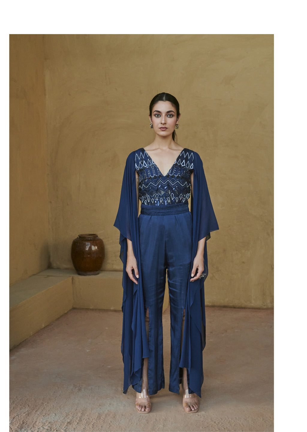 Navy Blue Beaded Cape Sleeve Slit Jumpsuit.